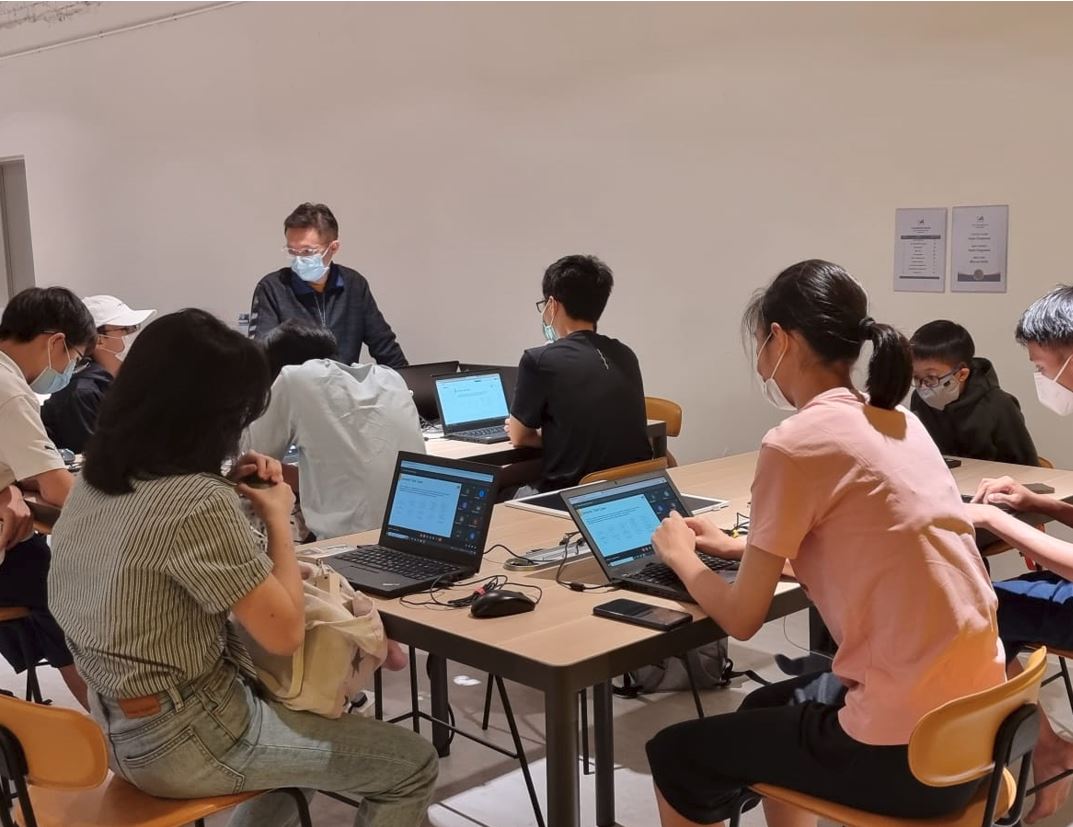 A Lab student engaged in a hands-on AI learning activity